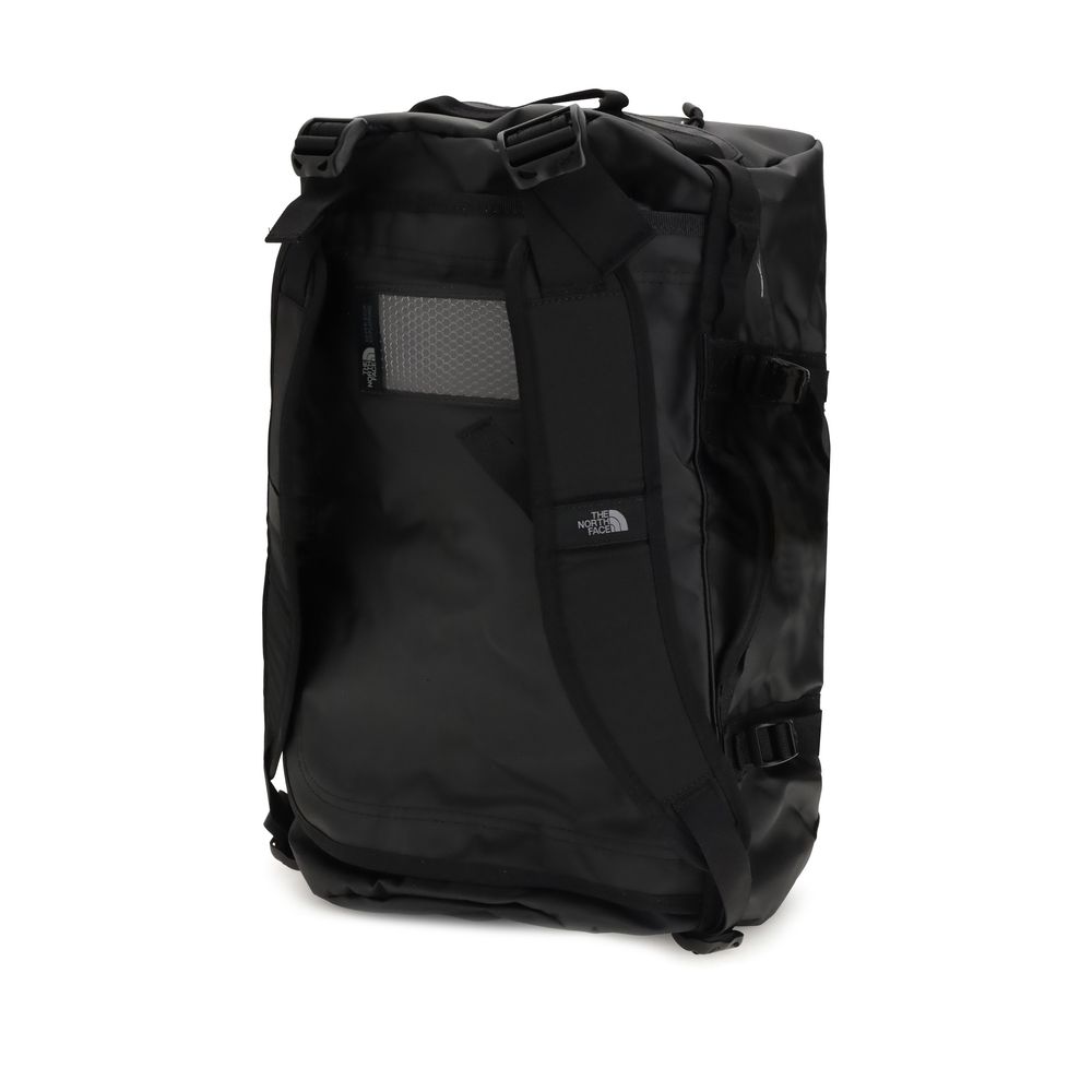 The North Face Black Nylon Luggage And Travel Base Camp Duffel S, waterproof, durable bag with padded handles for versatile use.