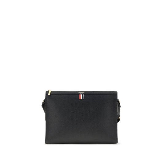 Thom Browne Black Calf Leather Bos Taurus Clutch Bag with top zipper and tricolor detail, featuring adjustable strap for versatile style.