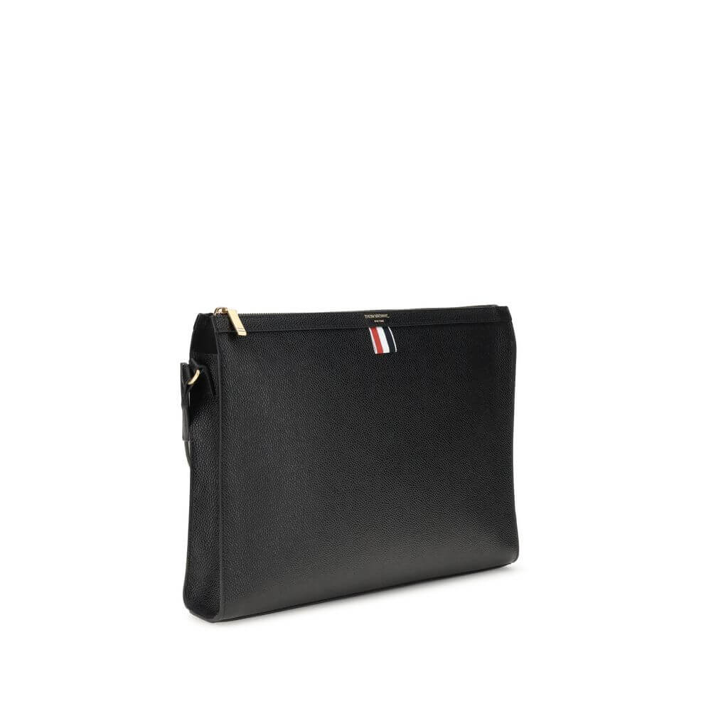 Thom Browne Black Calf Leather Bos Taurus Clutch Bag with tricolor detail and signature logo, features adjustable shoulder strap, AW25.