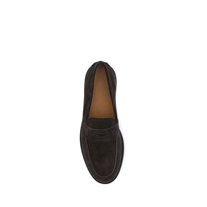Top view of Tod's Brown Calf Leather Bos Taurus Slip-On Loafers, featuring classic vamp and rubber pebbles on heel, elegant Italian design.