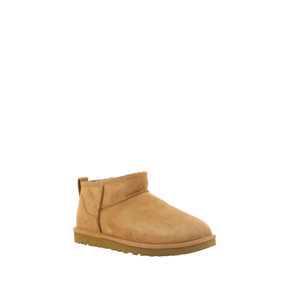 UGG Brown Goatskin Ankle Boots with shearling lining, knurled sole, monogram on heel, and suede design for comfort and style.
