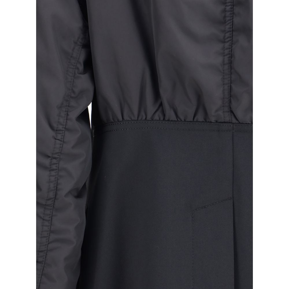 Detail of Undercover Black Polyester Bomber with seamless blend of classic blazer structure and bomber jacket elements.