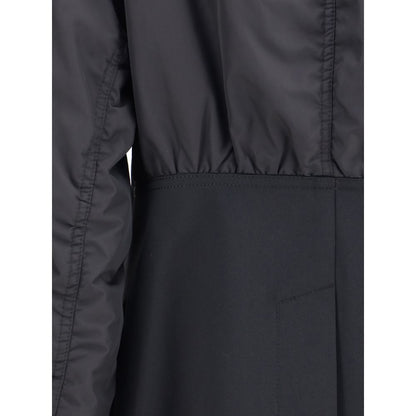 Detail of Undercover Black Polyester Bomber with seamless blend of classic blazer structure and bomber jacket elements.