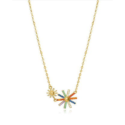 Gold necklace with colorful starburst design, ideal for a bold fashion statement.