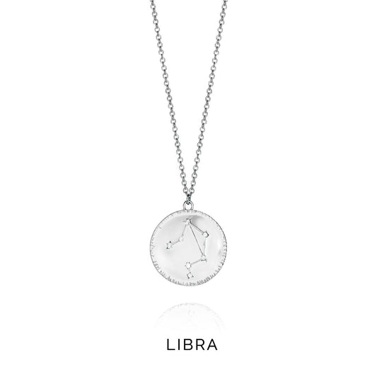 Libra constellation necklace with round pendant. Silver design.