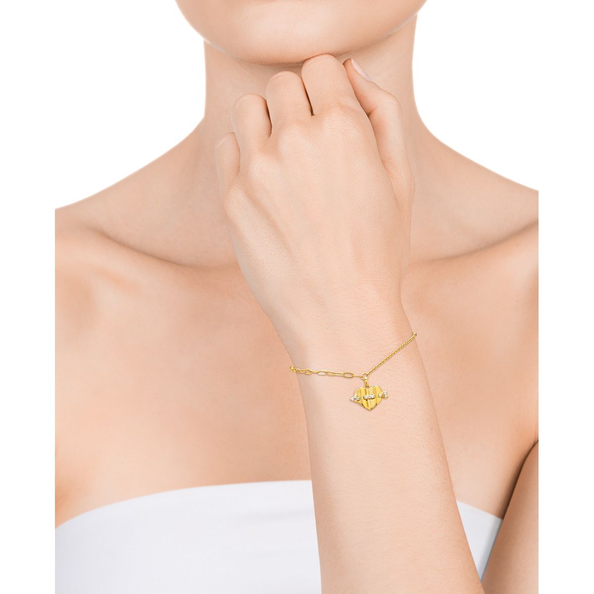 Gold bracelet worn on wrist, simple and elegant design