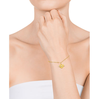 Gold bracelet worn on wrist, simple and elegant design