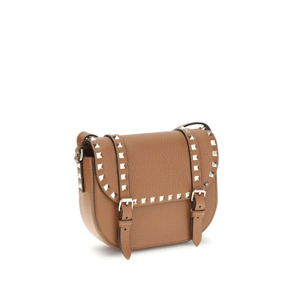 Valentino Garavani Beige Calf Leather Bos Taurus Shoulder Bag with iconic studs and adjustable strap, perfect for AW25 season fashion.