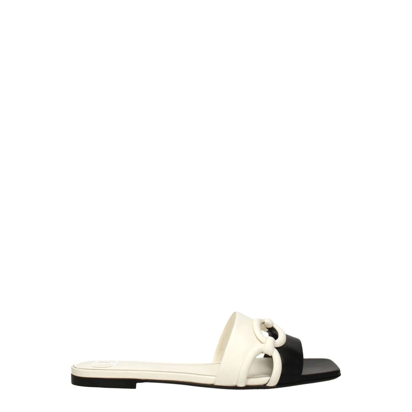 Valentino Garavani Black Leather Slippers with ivory accents, open toe design, and flat heel, showcased in a casual style.