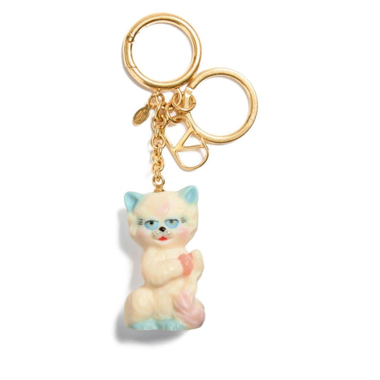 Valentino Garavani Le Chat De La Maison Nylon Bag Charm with Keychain featuring light beige cat charm and V logo.