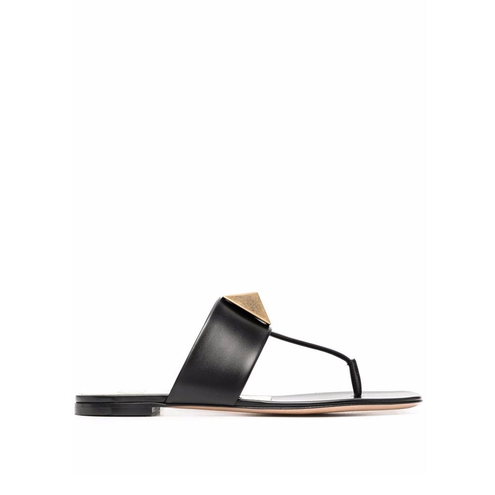 Valentino Garavani One Stud sandals in black leather with a thong strap and round toe, made in Italy for women.