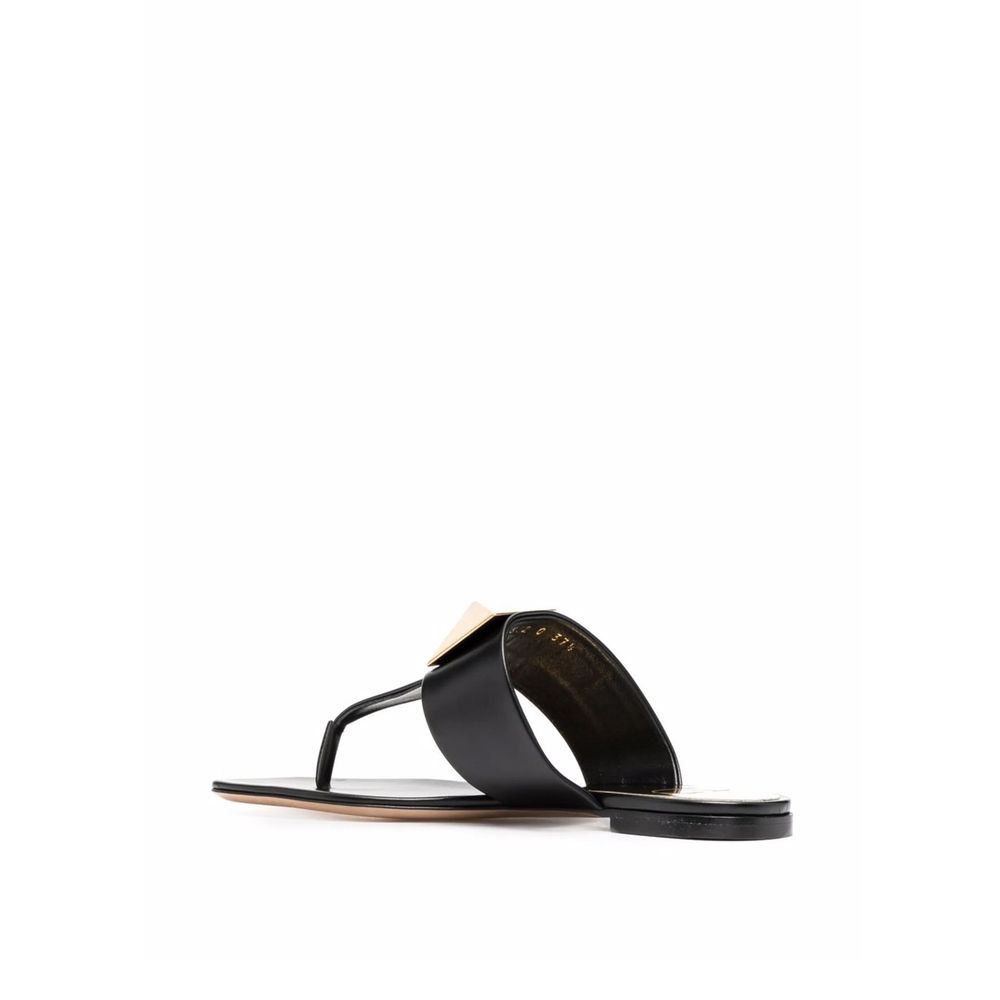 Valentino Garavani One Stud sandals in black leather with thong strap, round toe, made in Italy, women's footwear.