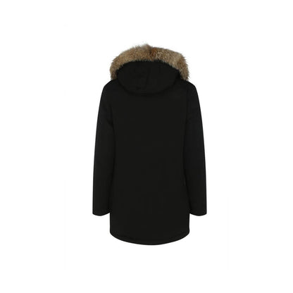 Back view of Woolrich Black Cotton Parka with fur-trimmed hood and oversized fit for AW25 season.