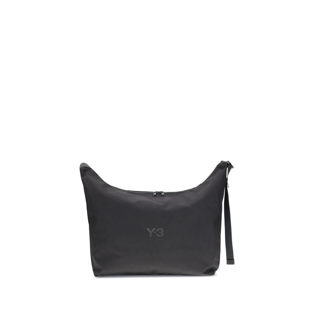 Y-3 Black Polyamide Shoulder Bag with zippered top closure and adjustable strap, featuring a printed logo for a contemporary design.