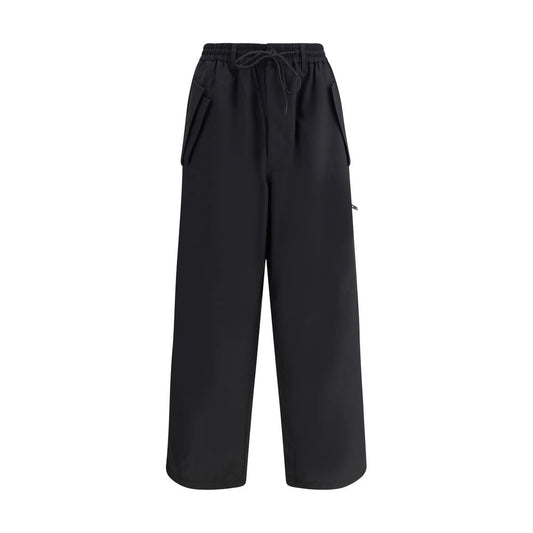 Y-3 Black Wool Casual Pants with adjustable waistband, zipper, button closure, and unique asymmetrical hem design.